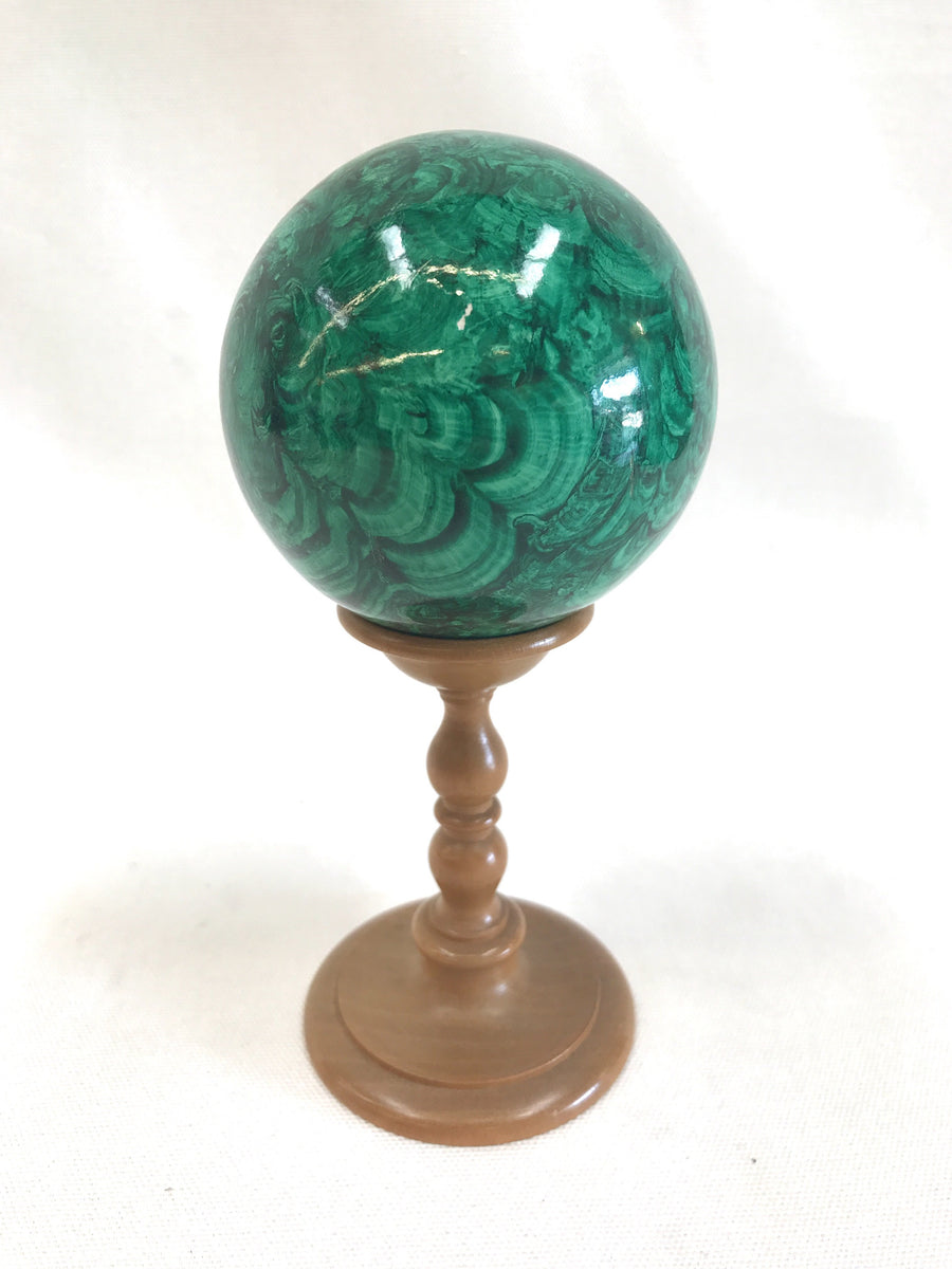 1970s faux malachite sphere on wood stand at The Mart Collective in Venice, CA